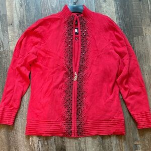 Christine Alexander Red Zip-Up Jacket with Black Detailing med jacket and tank.